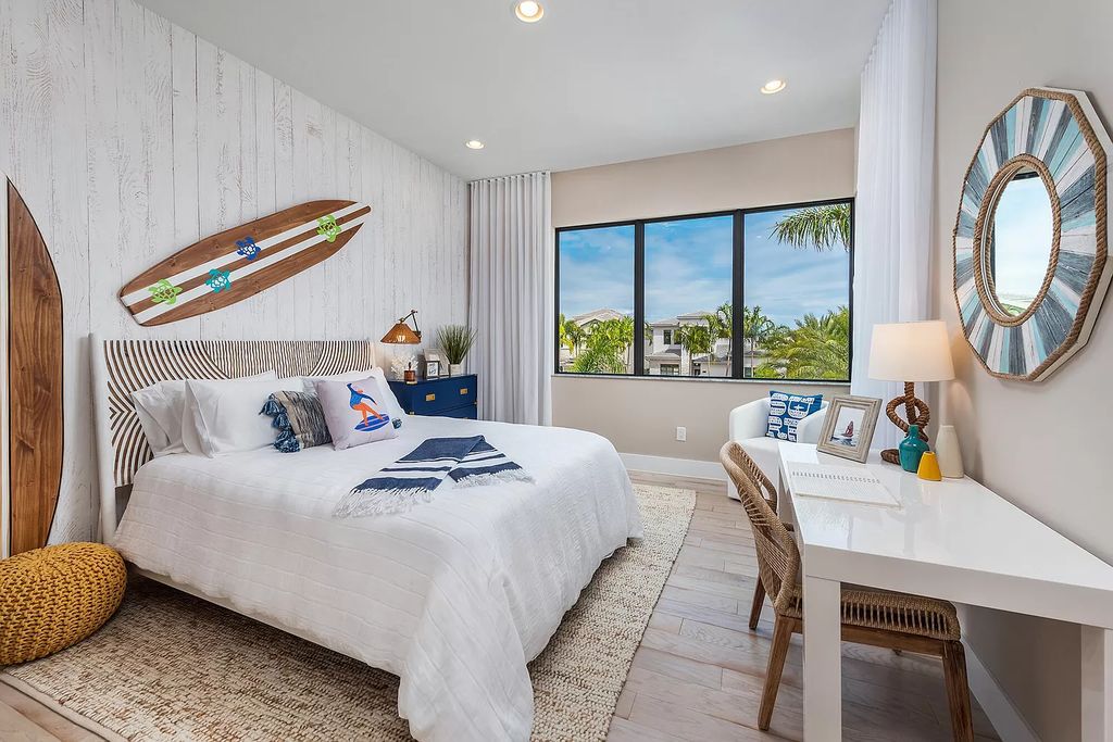 The Boca Raton Home offers a contemporary Geometric Pool with Negative Edge spa and gorgeous upgraded polished Travertine deck overlooking the lake now available for sale. This home located at 17161 Ludovica Ln, Boca Raton, Florida