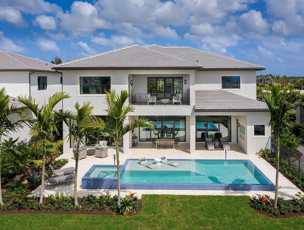 The Boca Raton Home with 2 story open great room concept floorplan and an amazing contemporary spill over pool now available for sale. This home located at 17167 Ludovica Ln, Boca Raton, Florida