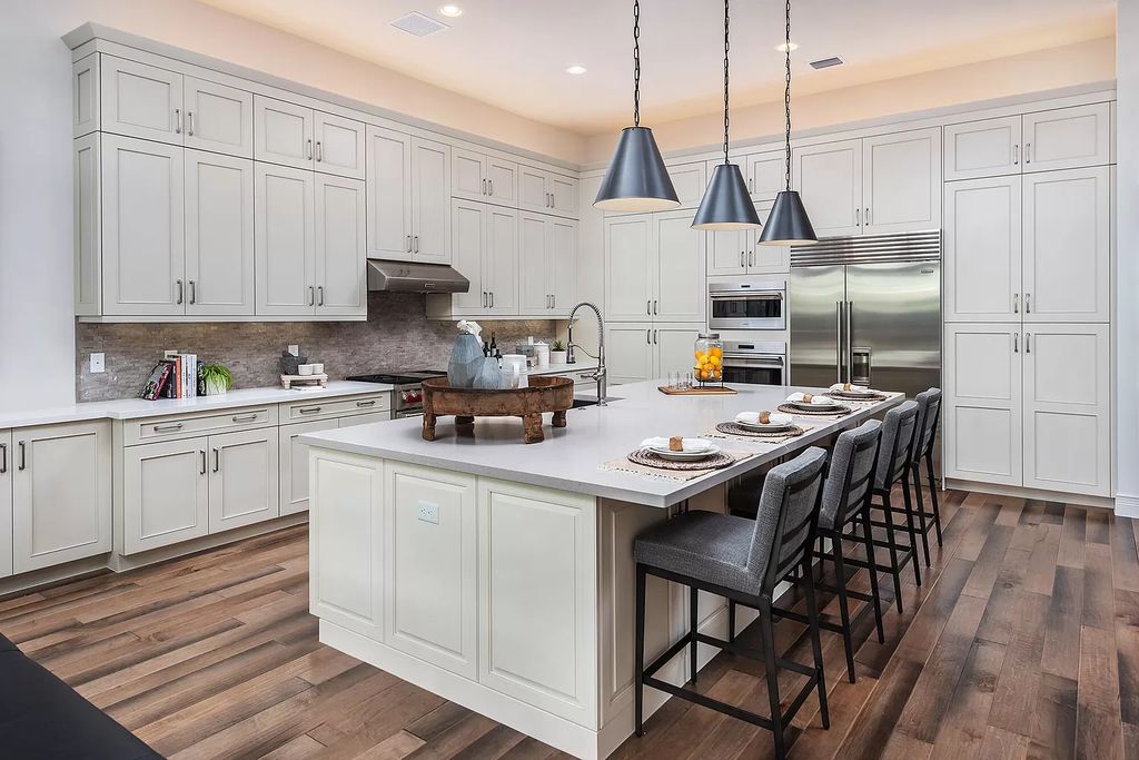 The Boca Raton Home with 2 story open great room concept floorplan and an amazing contemporary spill over pool now available for sale. This home located at 17167 Ludovica Ln, Boca Raton, Florida