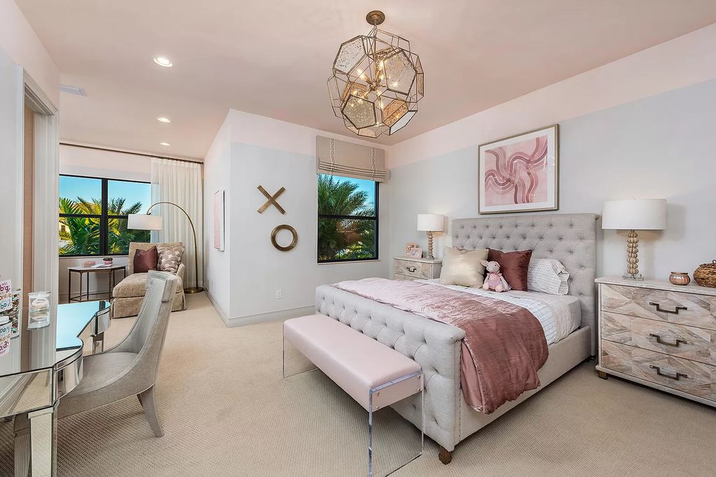 The Boca Raton Home with 2 story open great room concept floorplan and an amazing contemporary spill over pool now available for sale. This home located at 17167 Ludovica Ln, Boca Raton, Florida