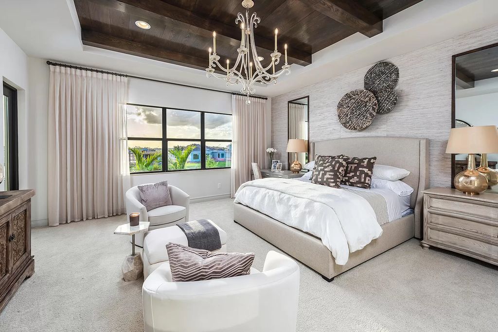 The Boca Raton Home with 2 story open great room concept floorplan and an amazing contemporary spill over pool now available for sale. This home located at 17167 Ludovica Ln, Boca Raton, Florida