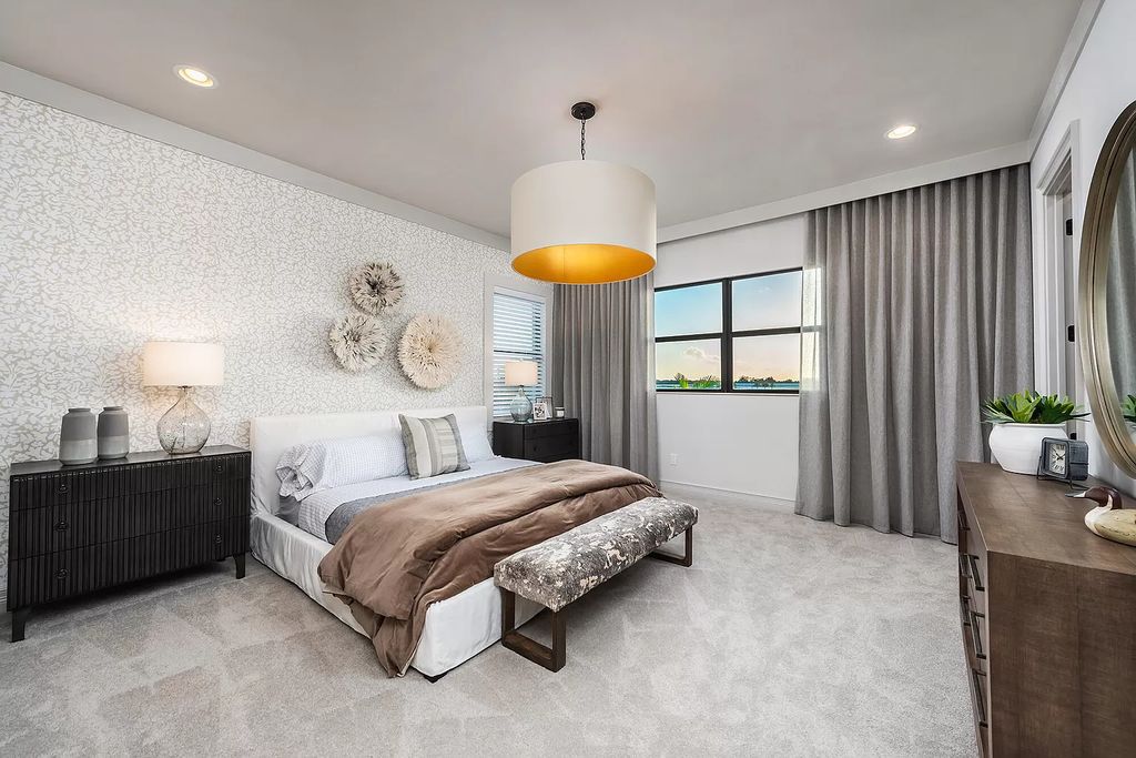 The Boca Raton Home with 2 story open great room concept floorplan and an amazing contemporary spill over pool now available for sale. This home located at 17167 Ludovica Ln, Boca Raton, Florida