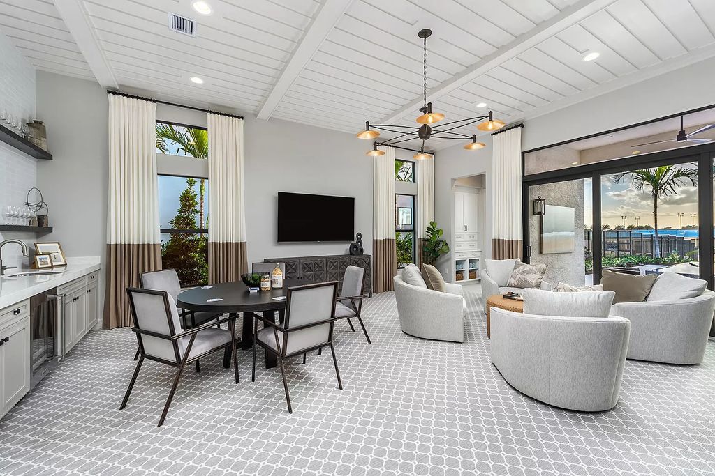 The Boca Raton Home with 2 story open great room concept floorplan and an amazing contemporary spill over pool now available for sale. This home located at 17167 Ludovica Ln, Boca Raton, Florida