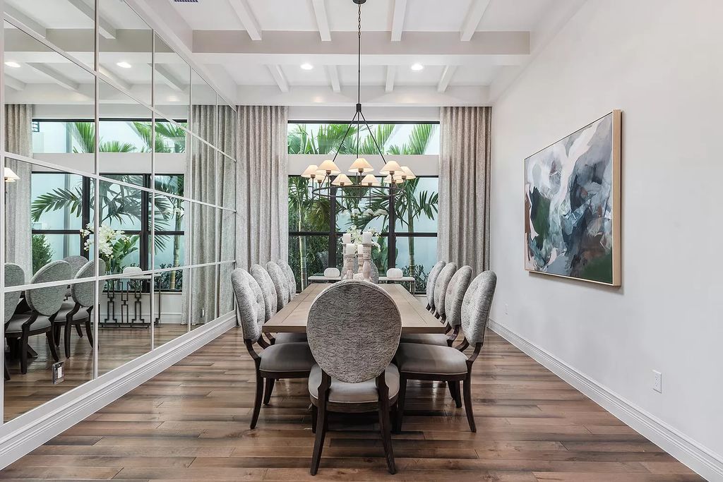 The Boca Raton Home with 2 story open great room concept floorplan and an amazing contemporary spill over pool now available for sale. This home located at 17167 Ludovica Ln, Boca Raton, Florida