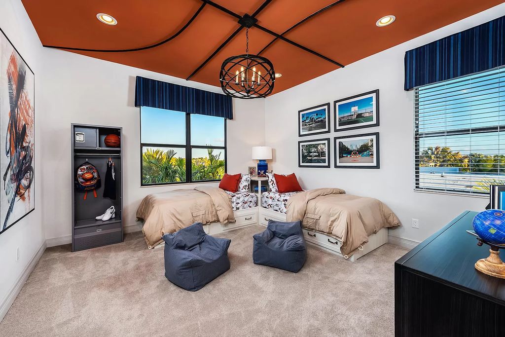 The Boca Raton Home with 2 story open great room concept floorplan and an amazing contemporary spill over pool now available for sale. This home located at 17167 Ludovica Ln, Boca Raton, Florida