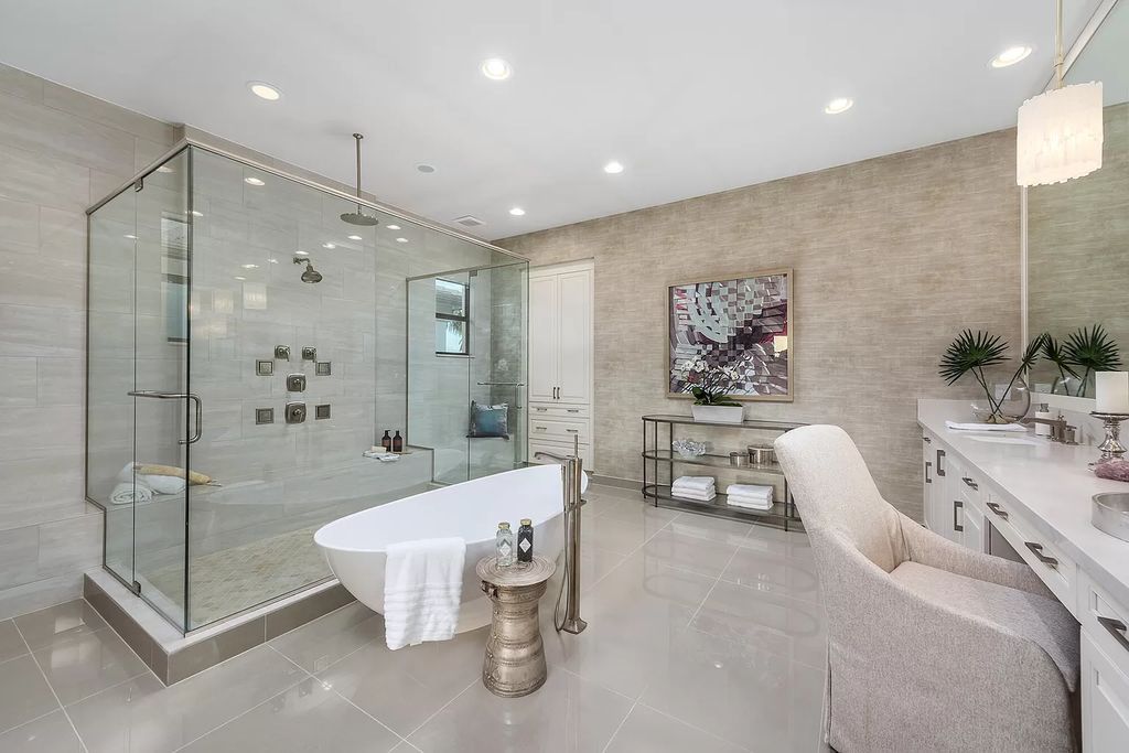 The Boca Raton Home with 2 story open great room concept floorplan and an amazing contemporary spill over pool now available for sale. This home located at 17167 Ludovica Ln, Boca Raton, Florida
