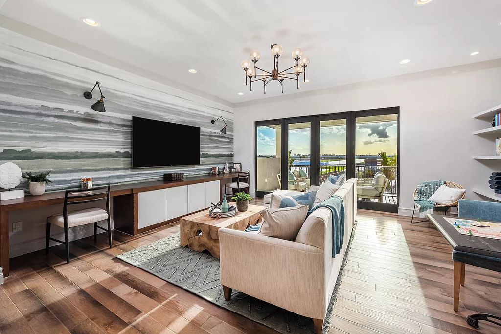 The Boca Raton Home with 2 story open great room concept floorplan and an amazing contemporary spill over pool now available for sale. This home located at 17167 Ludovica Ln, Boca Raton, Florida