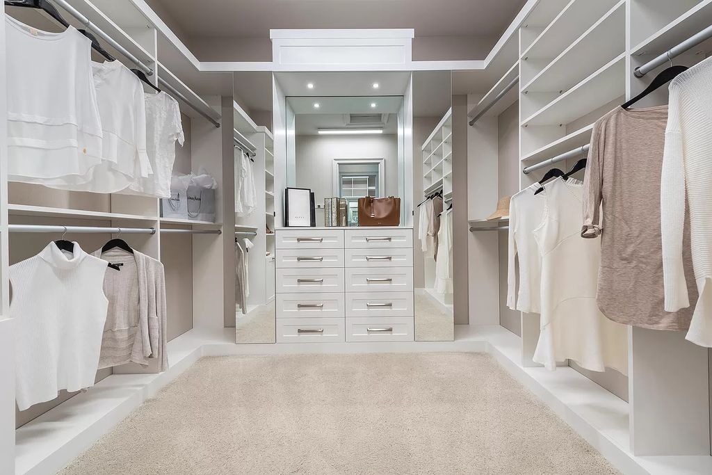 The Boca Raton Home with 2 story open great room concept floorplan and an amazing contemporary spill over pool now available for sale. This home located at 17167 Ludovica Ln, Boca Raton, Florida