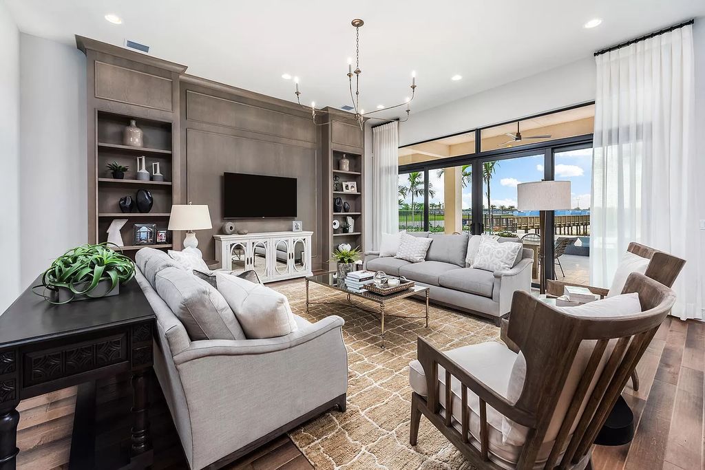 The Boca Raton Home with 2 story open great room concept floorplan and an amazing contemporary spill over pool now available for sale. This home located at 17167 Ludovica Ln, Boca Raton, Florida