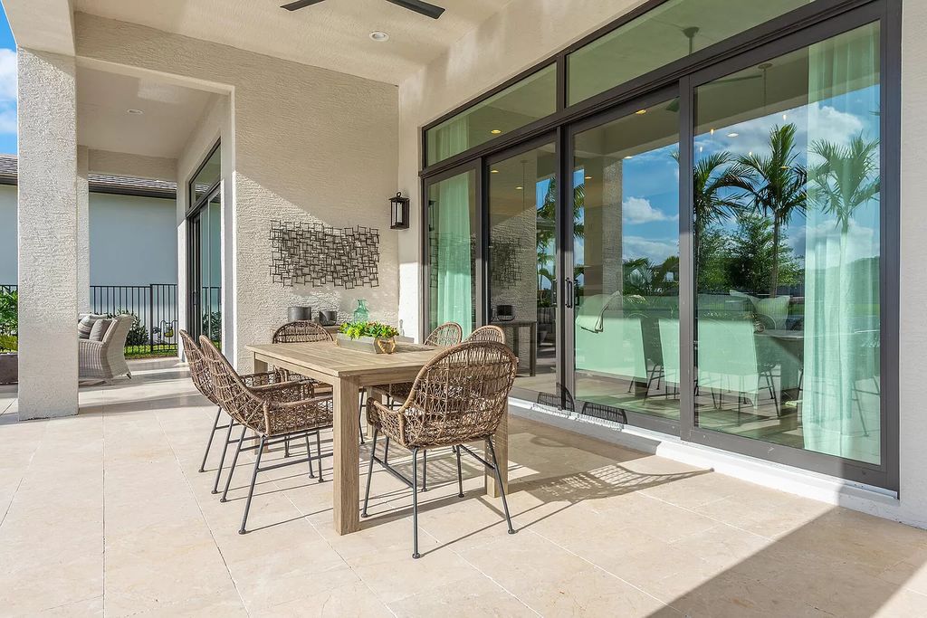 The Boca Raton Home with 2 story open great room concept floorplan and an amazing contemporary spill over pool now available for sale. This home located at 17167 Ludovica Ln, Boca Raton, Florida