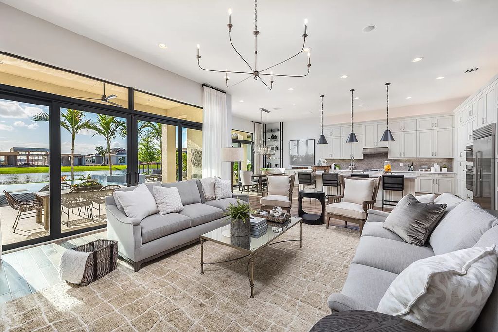 The Boca Raton Home with 2 story open great room concept floorplan and an amazing contemporary spill over pool now available for sale. This home located at 17167 Ludovica Ln, Boca Raton, Florida