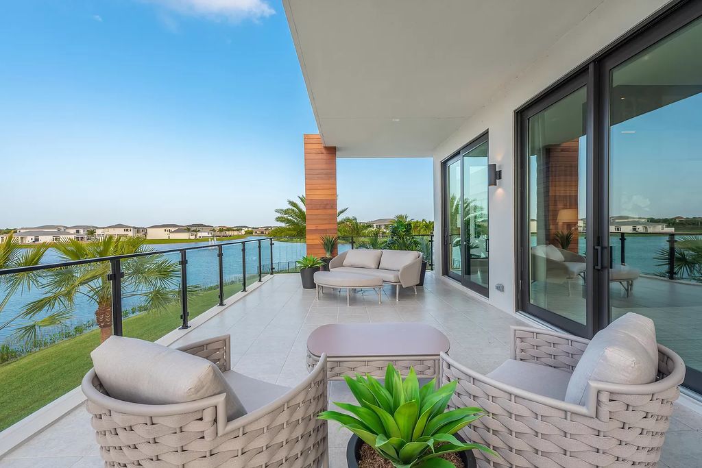 The Home in Boca Raton is a magnificent Modern estate featuring flat roof, floor to ceiling glass and extraordinary Ipey wood accents now available for sale. This home located at 17224 Brulee Breeze Way, Boca Raton, Florida