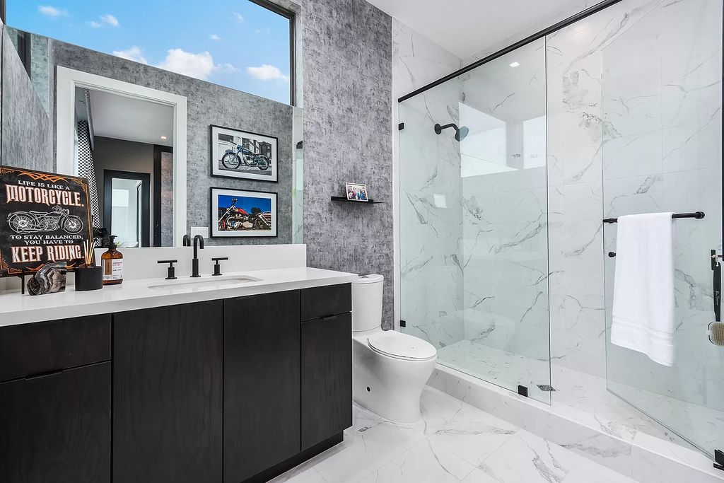 The Home in Boca Raton is a magnificent Modern estate featuring flat roof, floor to ceiling glass and extraordinary Ipey wood accents now available for sale. This home located at 17224 Brulee Breeze Way, Boca Raton, Florida