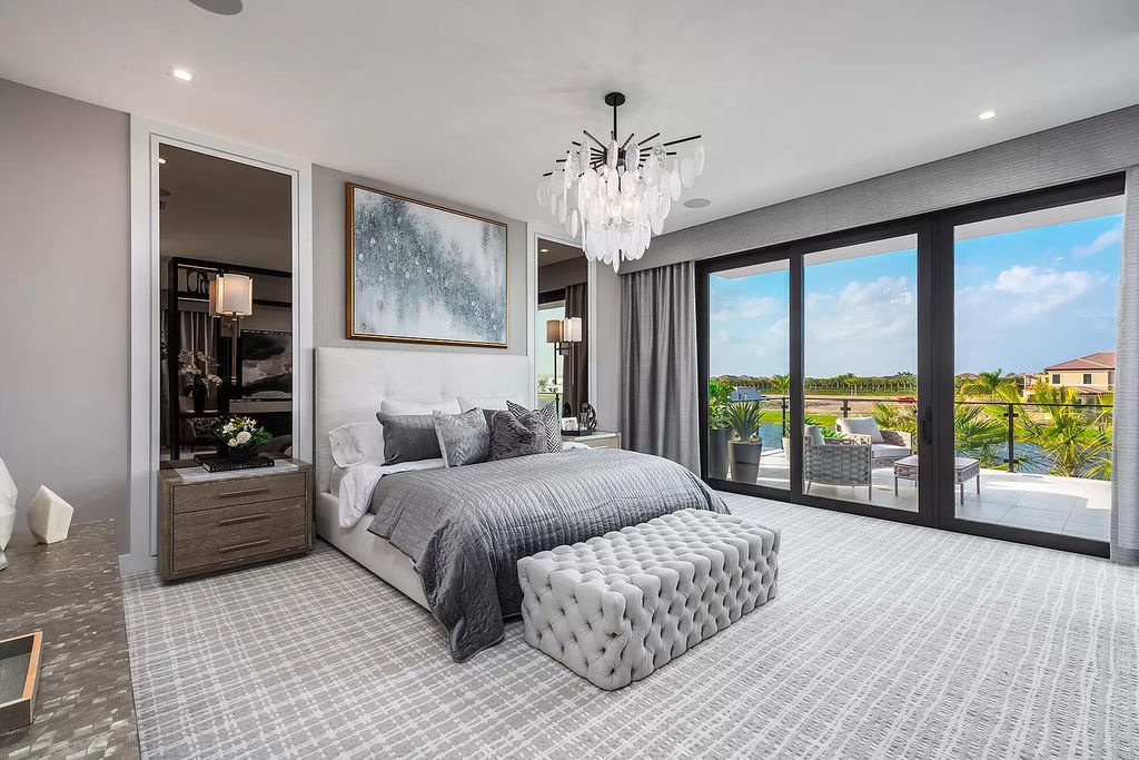 The Home in Boca Raton is a magnificent Modern estate featuring flat roof, floor to ceiling glass and extraordinary Ipey wood accents now available for sale. This home located at 17224 Brulee Breeze Way, Boca Raton, Florida