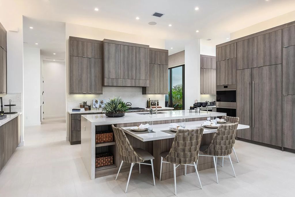 The Home in Boca Raton is a magnificent Modern estate featuring flat roof, floor to ceiling glass and extraordinary Ipey wood accents now available for sale. This home located at 17224 Brulee Breeze Way, Boca Raton, Florida
