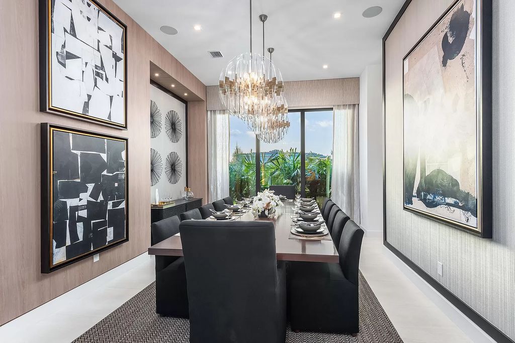 The Home in Boca Raton is a magnificent Modern estate featuring flat roof, floor to ceiling glass and extraordinary Ipey wood accents now available for sale. This home located at 17224 Brulee Breeze Way, Boca Raton, Florida