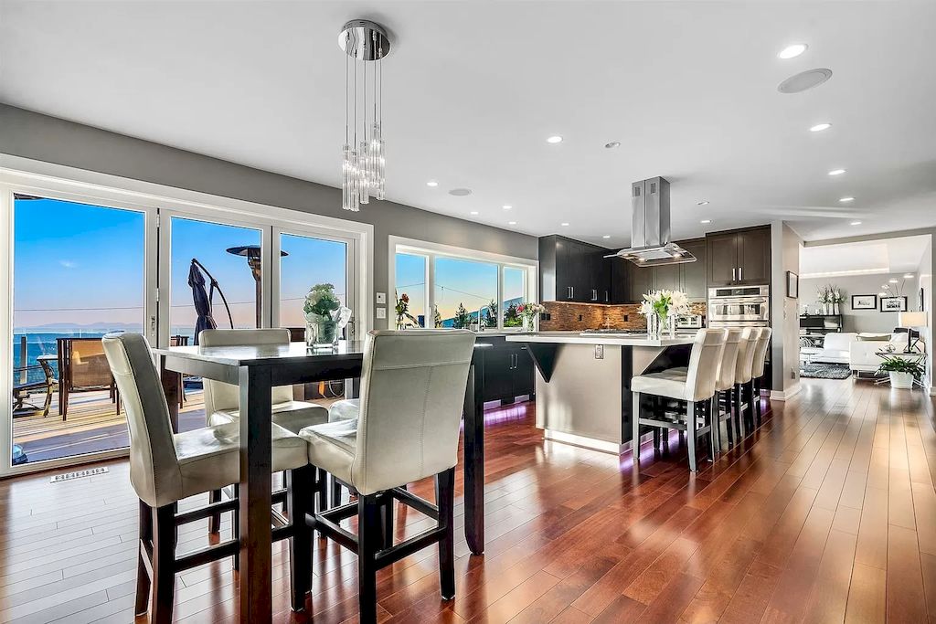 The Exquisite Property in North Vancouver features ocean & city views now available for sale. This home is located at 380 Newdale Ct, North Vancouver, BC V7N 3H4, Canada