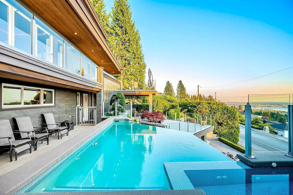 The Exquisite Property in North Vancouver features ocean & city views now available for sale. This home is located at 380 Newdale Ct, North Vancouver, BC V7N 3H4, Canada
