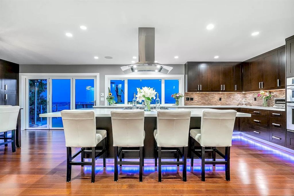 The Exquisite Property in North Vancouver features ocean & city views now available for sale. This home is located at 380 Newdale Ct, North Vancouver, BC V7N 3H4, Canada