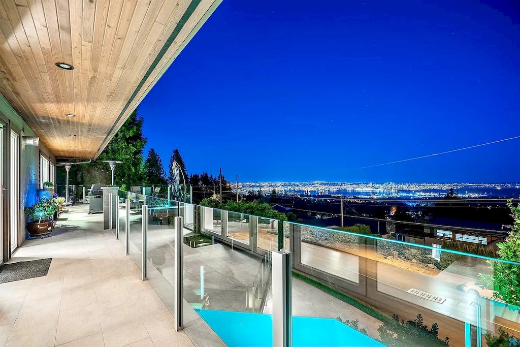 The Exquisite Property in North Vancouver features ocean & city views now available for sale. This home is located at 380 Newdale Ct, North Vancouver, BC V7N 3H4, Canada
