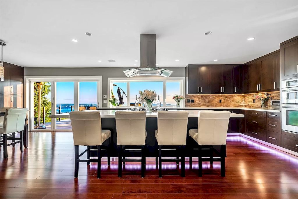 The Exquisite Property in North Vancouver features ocean & city views now available for sale. This home is located at 380 Newdale Ct, North Vancouver, BC V7N 3H4, Canada