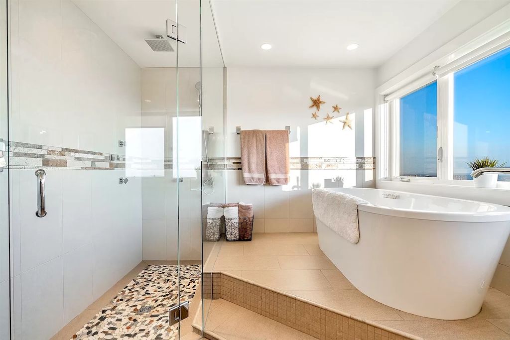 The Exquisite Property in North Vancouver features ocean & city views now available for sale. This home is located at 380 Newdale Ct, North Vancouver, BC V7N 3H4, Canada