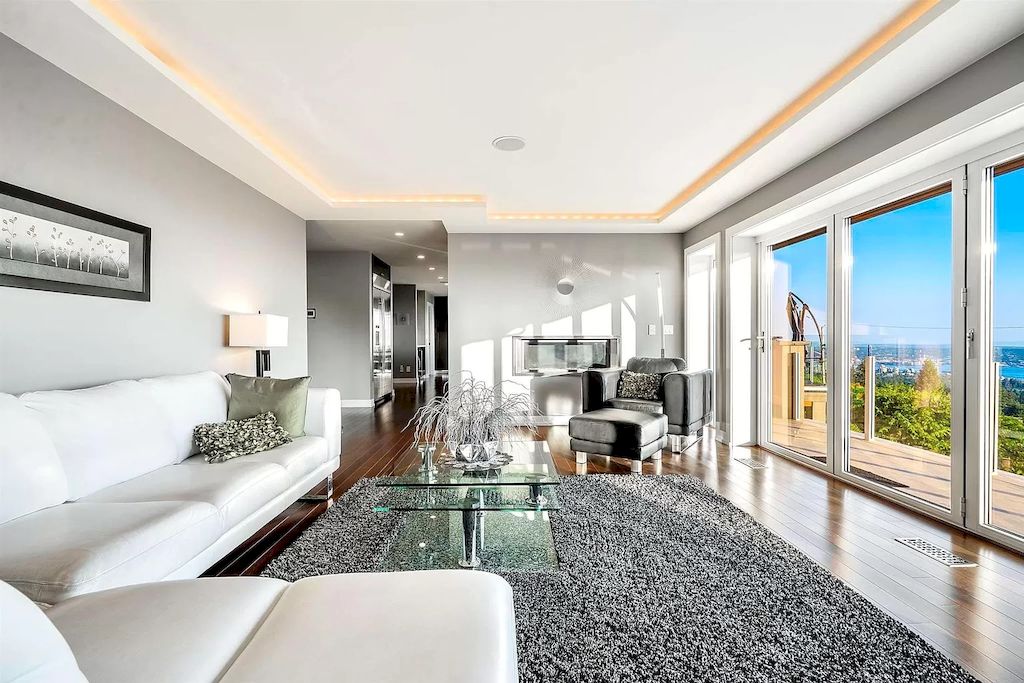 The Exquisite Property in North Vancouver features ocean & city views now available for sale. This home is located at 380 Newdale Ct, North Vancouver, BC V7N 3H4, Canada