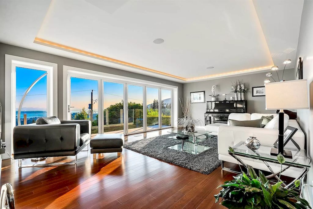 The Exquisite Property in North Vancouver features ocean & city views now available for sale. This home is located at 380 Newdale Ct, North Vancouver, BC V7N 3H4, Canada