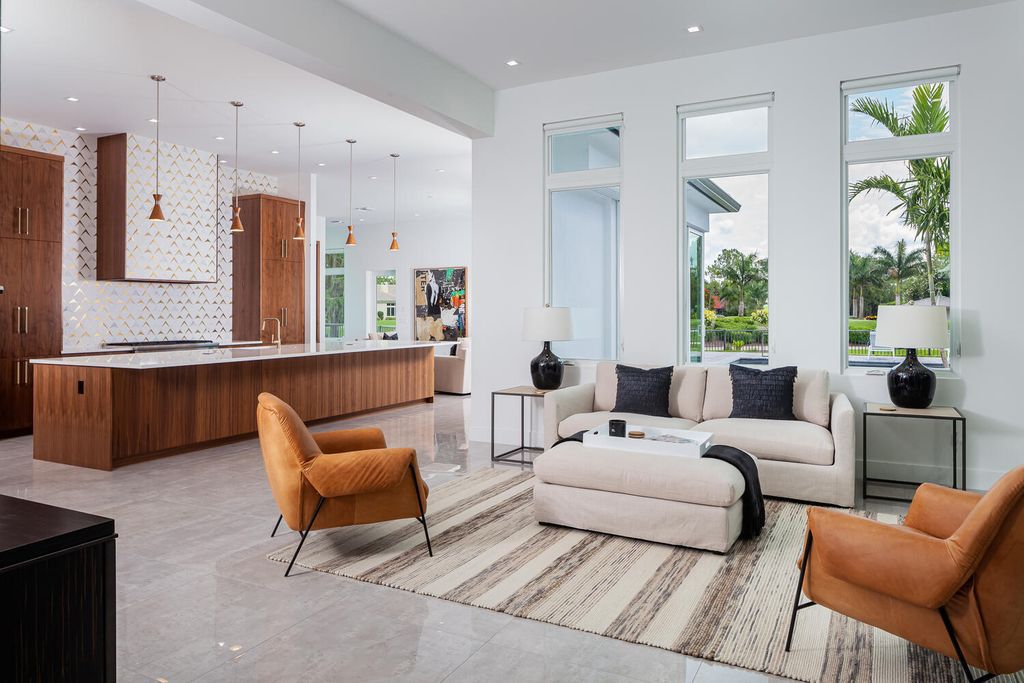 The Home in Naples is a perfect new estate expertly crafted with cutting-edge international design and mid-century modern influences now available for sale. This home located at 4445 Silver Fox Dr, Naples, Florida