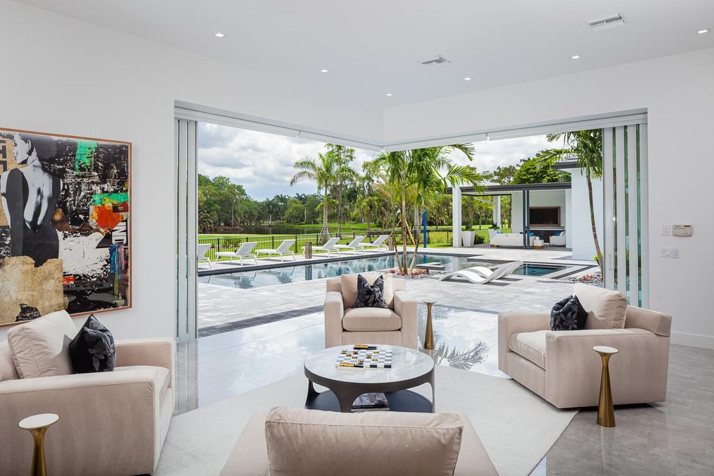 The Home in Naples is a perfect new estate expertly crafted with cutting-edge international design and mid-century modern influences now available for sale. This home located at 4445 Silver Fox Dr, Naples, Florida