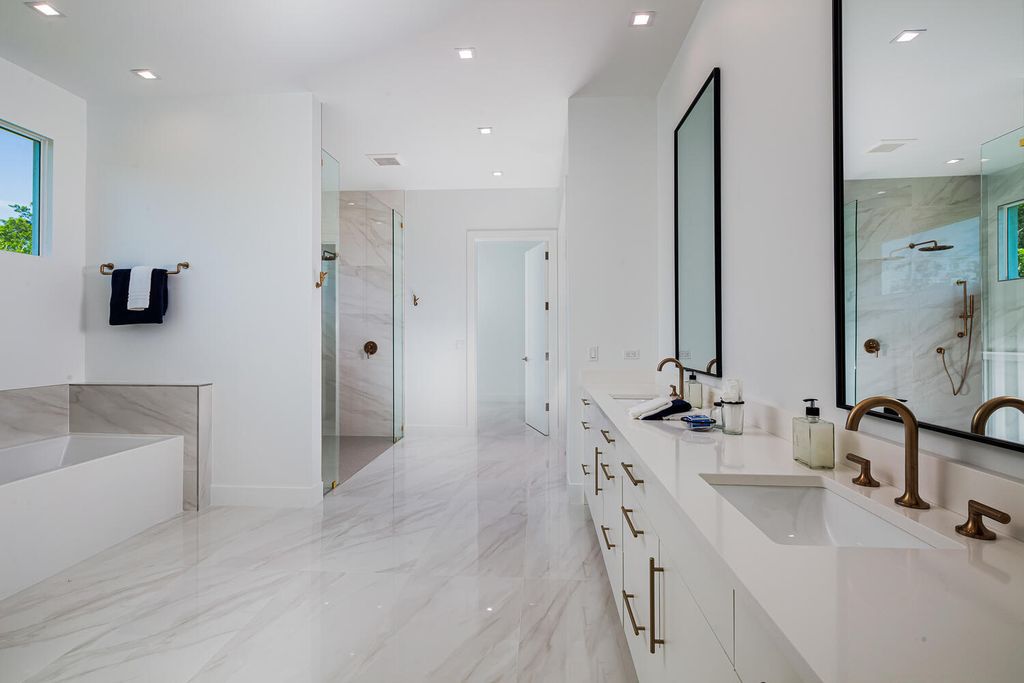 The Home in Naples is a perfect new estate expertly crafted with cutting-edge international design and mid-century modern influences now available for sale. This home located at 4445 Silver Fox Dr, Naples, Florida