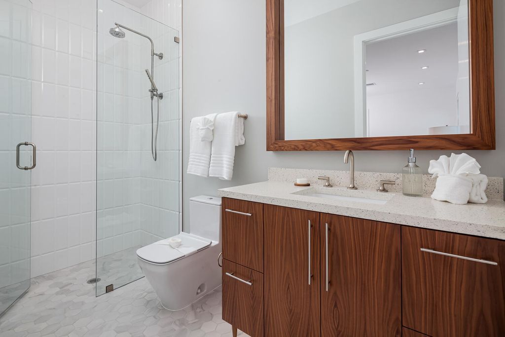 The Home in Naples is a perfect new estate expertly crafted with cutting-edge international design and mid-century modern influences now available for sale. This home located at 4445 Silver Fox Dr, Naples, Florida