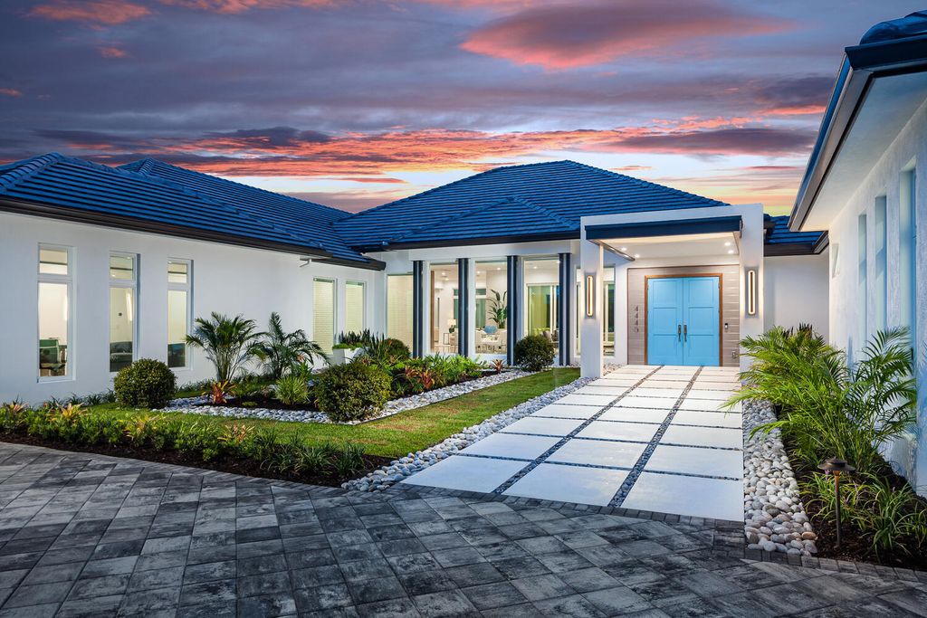 The Home in Naples is a perfect new estate expertly crafted with cutting-edge international design and mid-century modern influences now available for sale. This home located at 4445 Silver Fox Dr, Naples, Florida