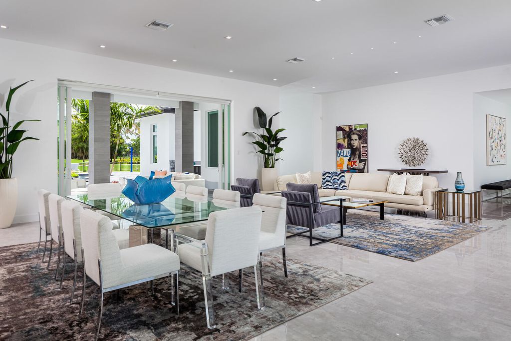 The Home in Naples is a perfect new estate expertly crafted with cutting-edge international design and mid-century modern influences now available for sale. This home located at 4445 Silver Fox Dr, Naples, Florida