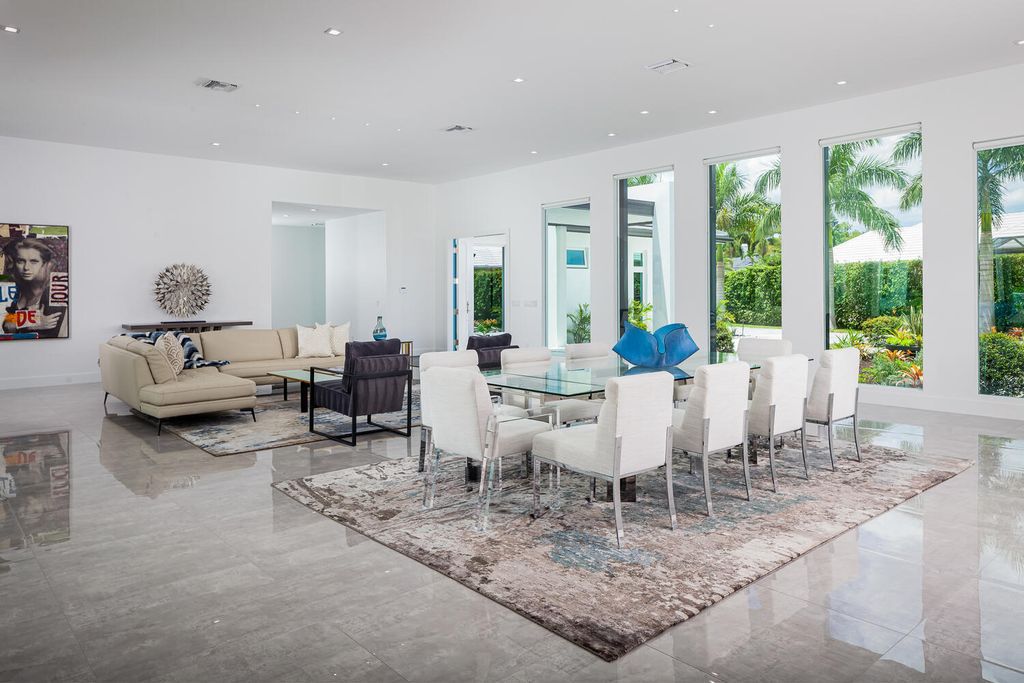 The Home in Naples is a perfect new estate expertly crafted with cutting-edge international design and mid-century modern influences now available for sale. This home located at 4445 Silver Fox Dr, Naples, Florida