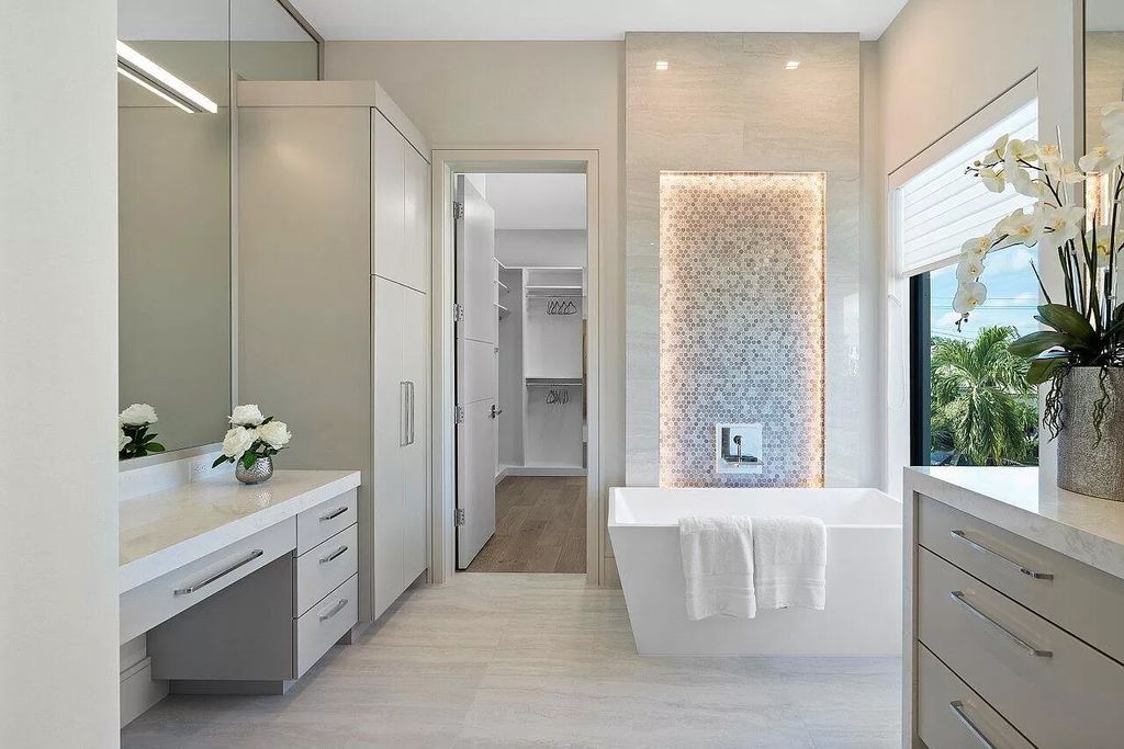 The Home in Boca Raton is an exquisite estate has been professionally decorated and furnished including window treatments now available for sale. This home located at 731 NE 32nd St, Boca Raton, Florida