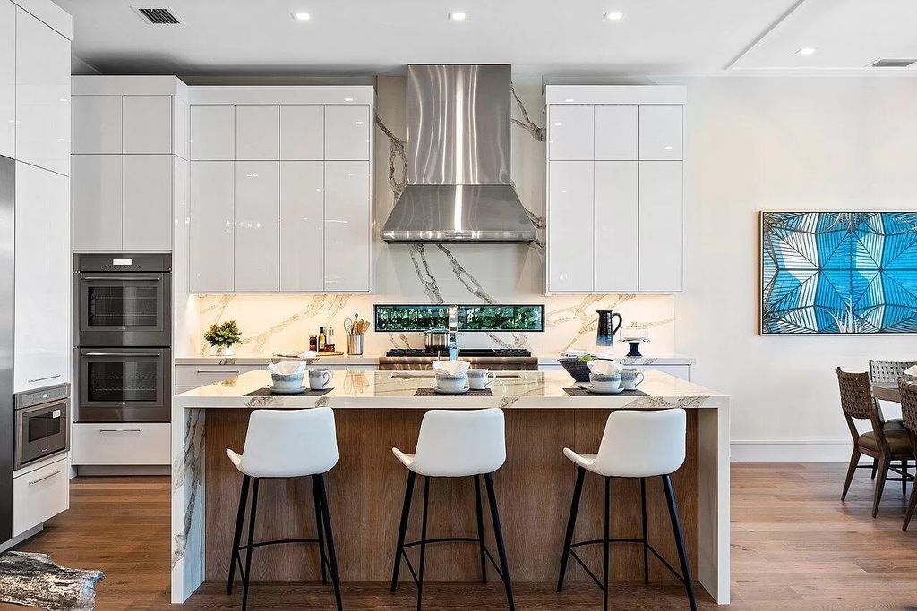 The Home in Boca Raton is an exquisite estate has been professionally decorated and furnished including window treatments now available for sale. This home located at 731 NE 32nd St, Boca Raton, Florida
