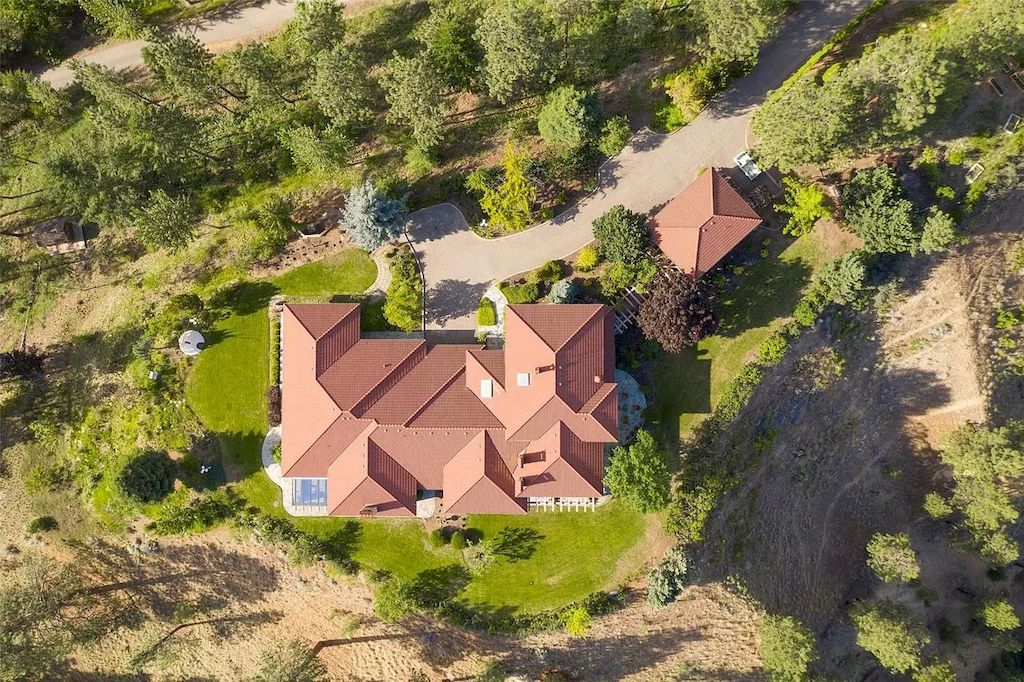 The Gated Hilltop Estate in Kelowna is a truly exceptional home now available for sale. This home is located at 2834 Belgo Rd, Kelowna, BC V1P 1E2, Canada