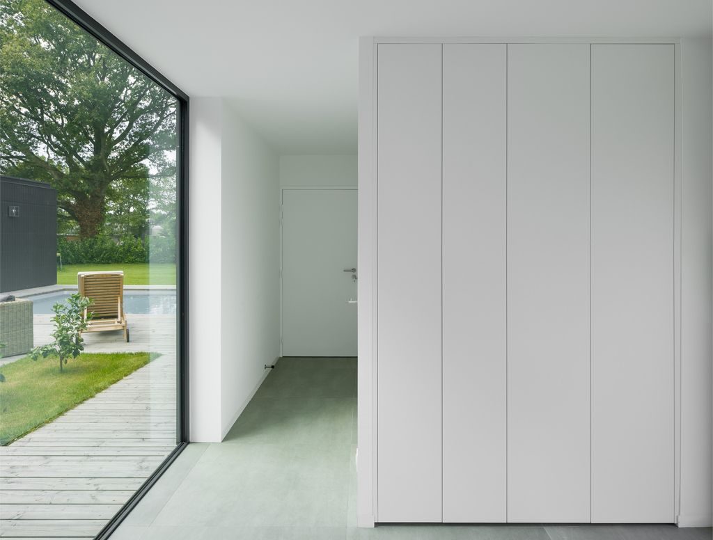 House U, Stunning rectangular shape House open to the sky by Atelier 56S