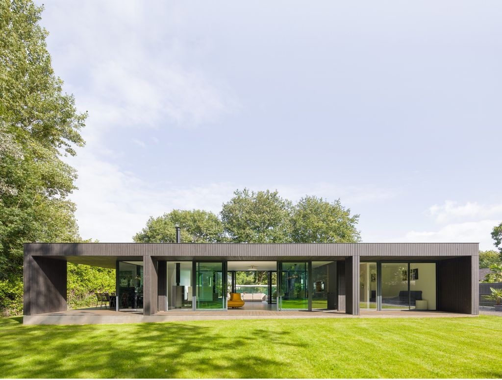 House U, Stunning rectangular shape House open to the sky by Atelier 56S
