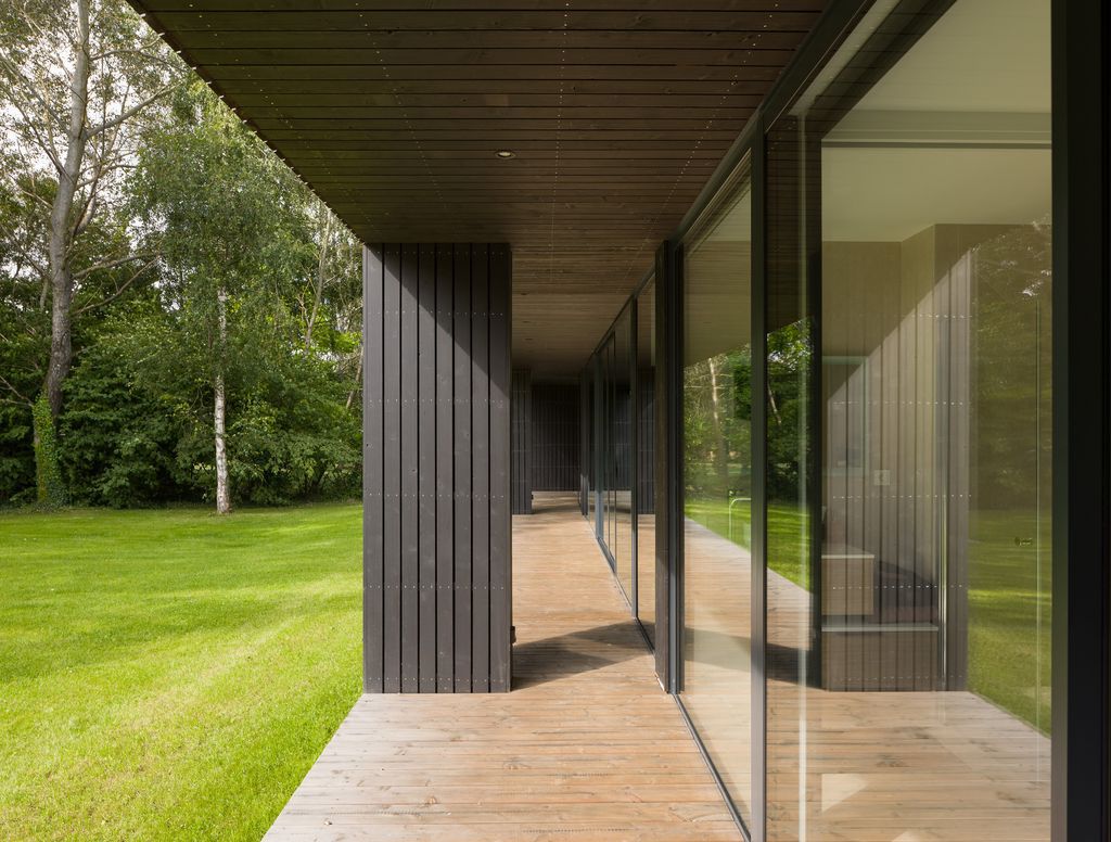 House U, Stunning rectangular shape House open to the sky by Atelier 56S