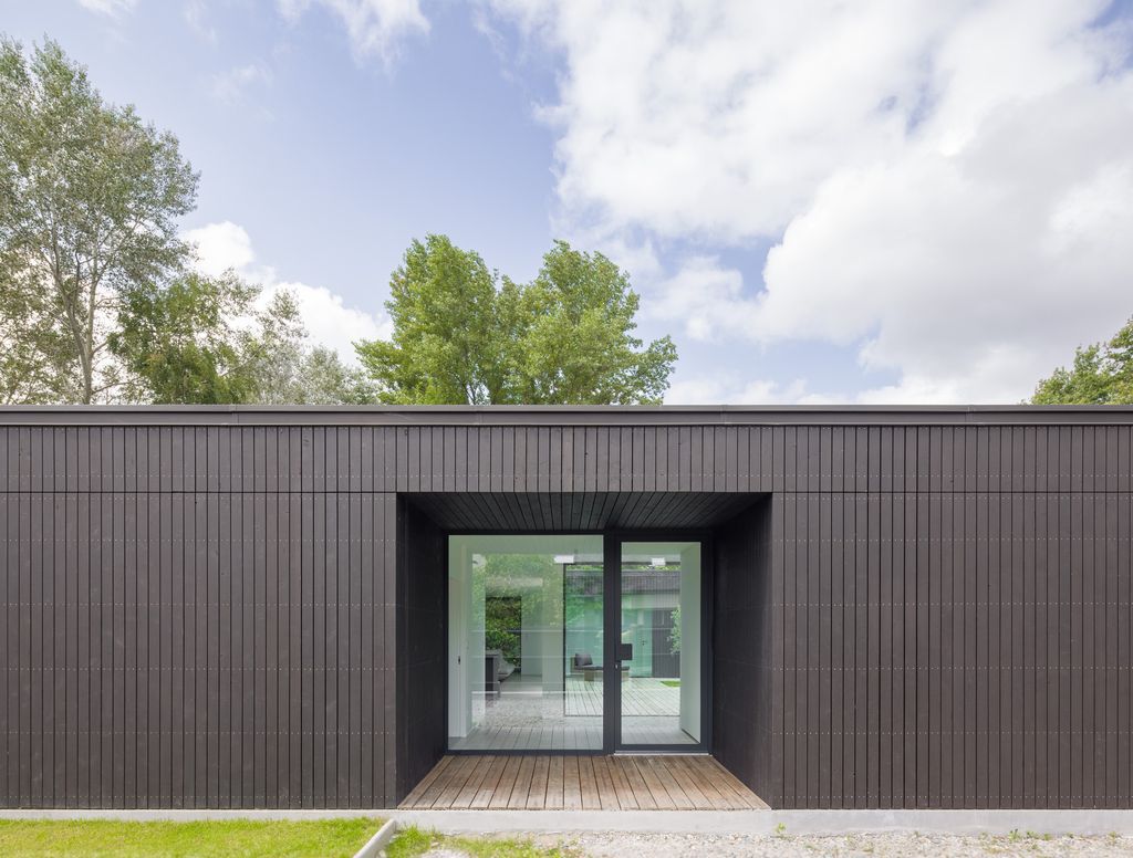 House U, Stunning rectangular shape House open to the sky by Atelier 56S