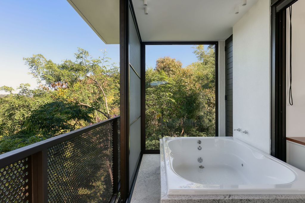 House of Stones with Stunning Views among Nature by TETRO Arquitetura 11