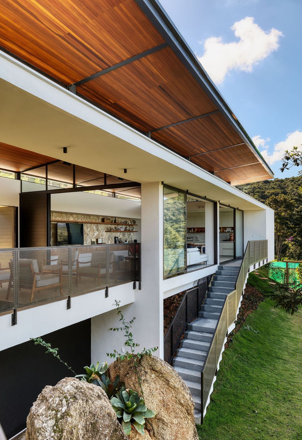House of Stones with Stunning Views among Nature by TETRO Arquitetura 13