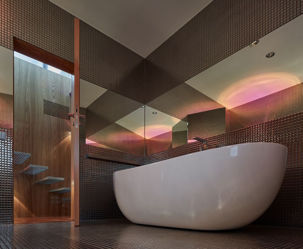 Lazy House Sits Between a Forest and a Valley by  Petrjanda/ Brainwork