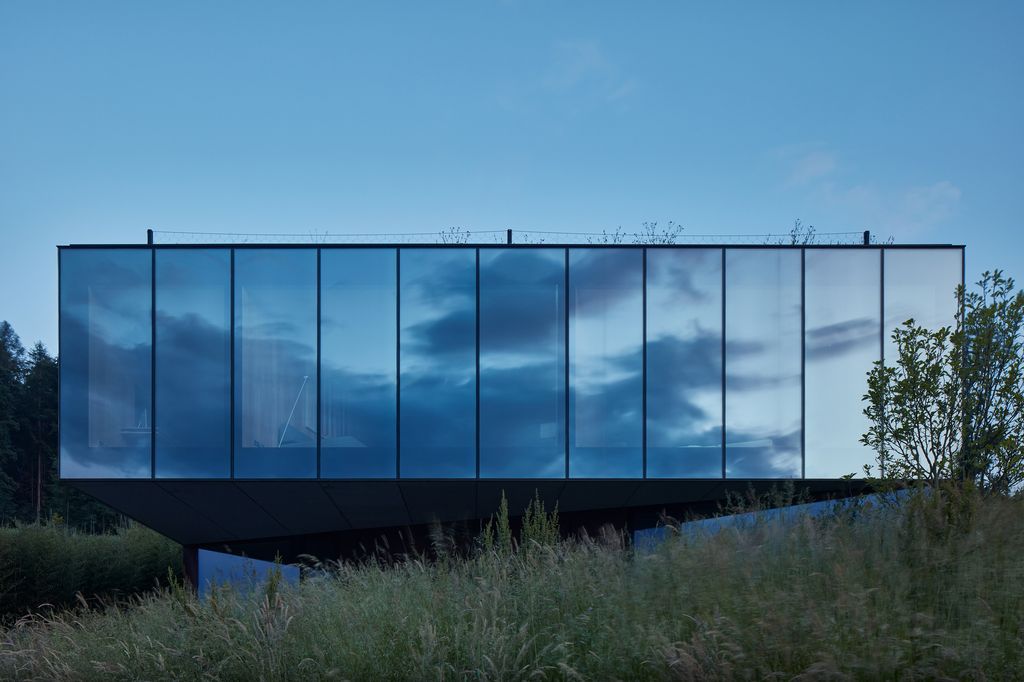 Lazy House Sits Between a Forest and a Valley by  Petrjanda/ Brainwork