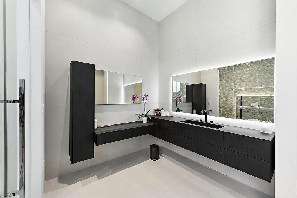 The Home in Boca Raton is a newly completed modern luxury home with Smart Home Technology in St Andrews Country Club now available for sale. This home located at 17745 Scarsdale Way, Boca Raton, Florida