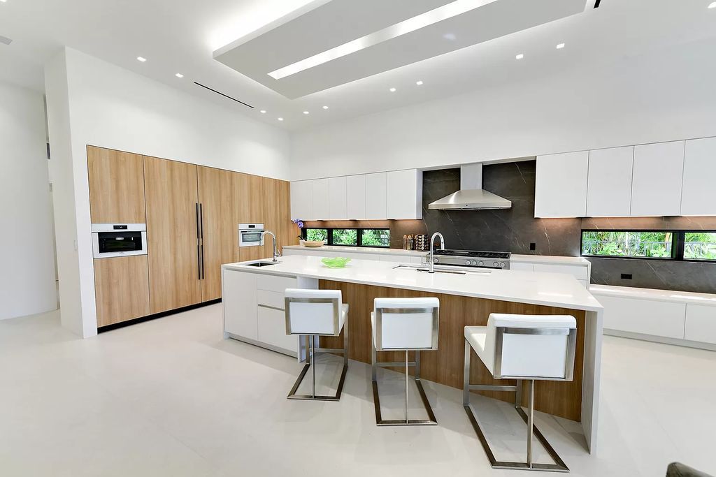 The Home in Boca Raton is a newly completed modern luxury home with Smart Home Technology in St Andrews Country Club now available for sale. This home located at 17745 Scarsdale Way, Boca Raton, Florida