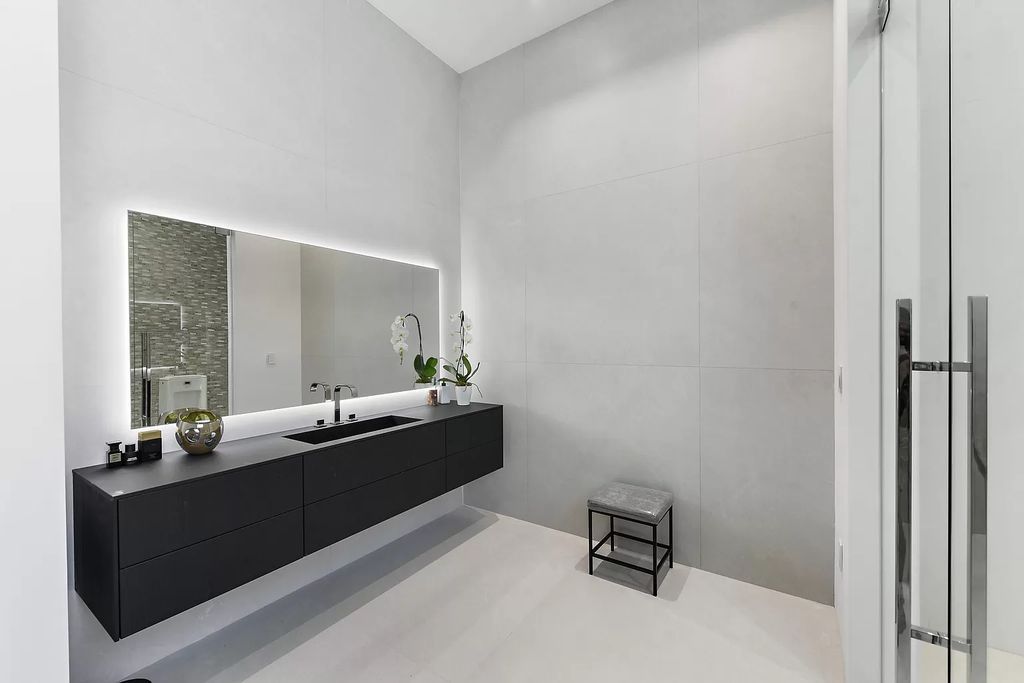 The Home in Boca Raton is a newly completed modern luxury home with Smart Home Technology in St Andrews Country Club now available for sale. This home located at 17745 Scarsdale Way, Boca Raton, Florida