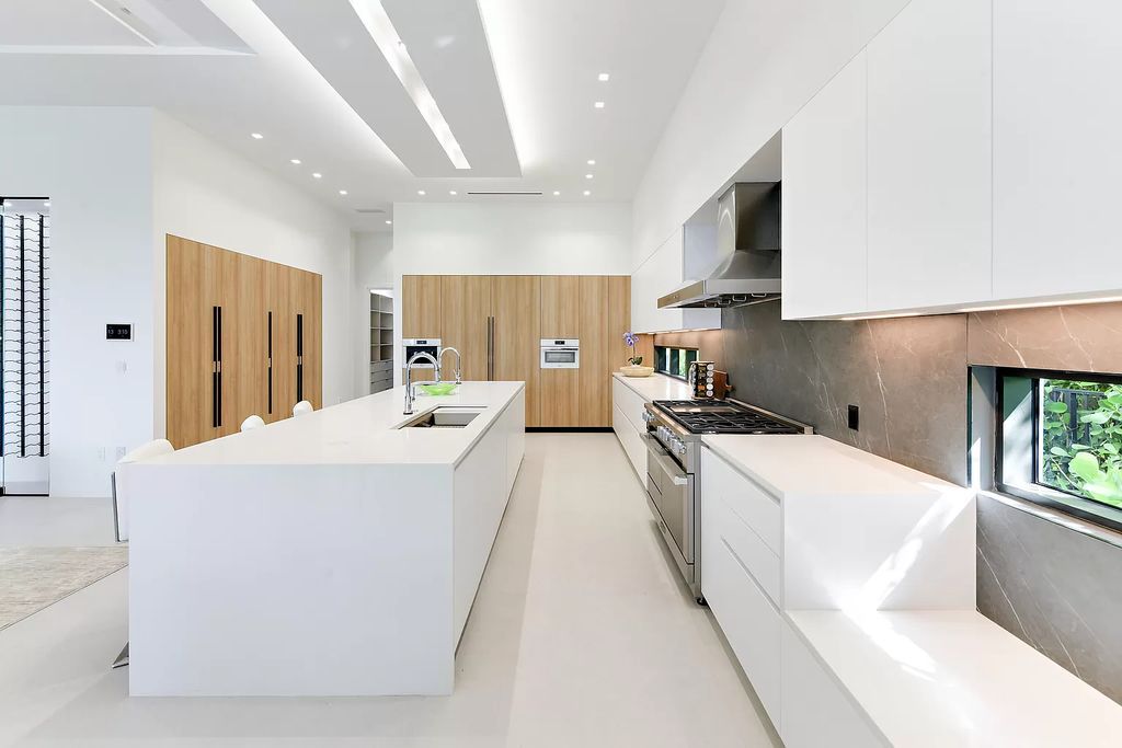 The Home in Boca Raton is a newly completed modern luxury home with Smart Home Technology in St Andrews Country Club now available for sale. This home located at 17745 Scarsdale Way, Boca Raton, Florida